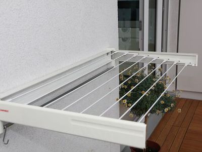Установка веревок на балкон, чтобы сушить бельё — правила монтажа